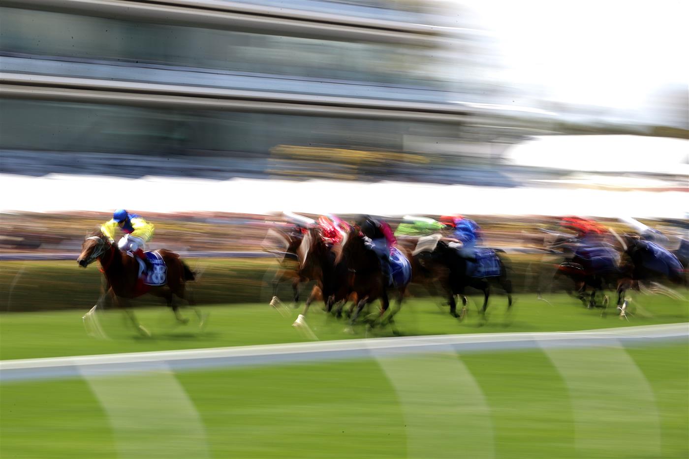 MELBOURNE, AUSTRALIA - NOVEMBER 04: Craig Williams riding #18 See You In Heaven leads the field in race 3, the Darley Ottawa Stakes during 2021 Oaks Day at Flemington Racecourse on November 04, 2021 in Melbourne, Australia. (Photo by Robert Cianflone/Getty Images)
