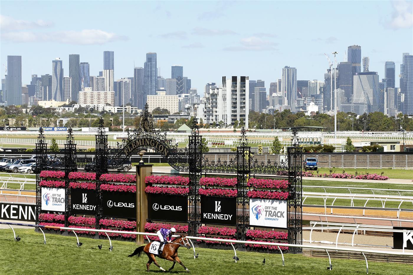 MELBOURNE, AUSTRALIA - NOVEMBER 04: James McDonald riding #16 Espiona wins race 5, the Off The Track Desirable Stakes during 2021 Oaks Day at Flemington Racecourse on November 04, 2021 in Melbourne, Australia. (Photo by Darrian Traynor/Getty Images)