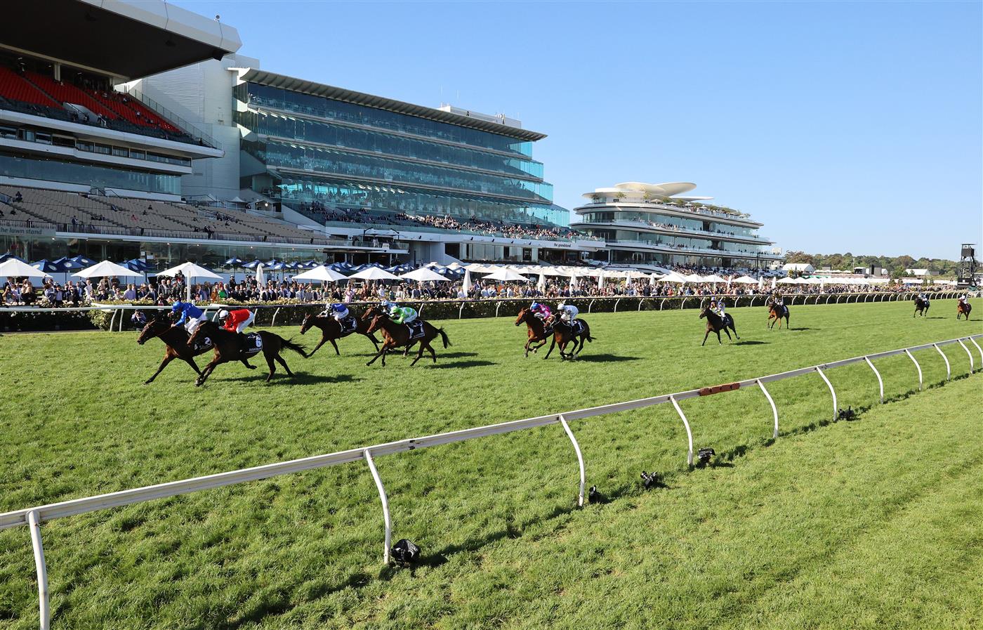 MELBOURNE, AUSTRALIA - NOVEMBER 04: Damien Oliver riding #2 Willowy leads Michael Dee #6 Douceur to win race 8, the Kennedy Oaks during 2021 Oaks Day at Flemington Racecourse on November 04, 2021 in Melbourne, Australia. (Photo by Robert Cianflone/Getty Images)