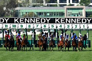 MELBOURNE, AUSTRALIA - NOVEMBER 04: The field jump the barrier in race 8, the Kennedy Oaks during 2021 Oaks Day at Flemington Racecourse on November 04, 2021 in Melbourne, Australia. (Photo by Quinn Rooney/Getty Images)