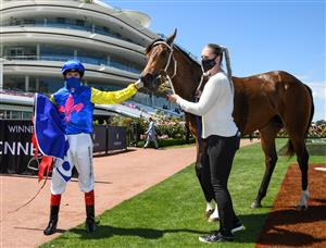 MELBOURNE, AUSTRALIA - NOVEMBER 04: Craig Williams after riding See You In Heaven winning Race 3, the Darley Ottawa Stakes, during 2021 Oaks Day at Flemington Racecourse on November 04, 2021 in Melbourne, Australia. (Photo by Vince Caligiuri/Getty Images)