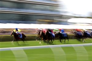 MELBOURNE, AUSTRALIA - NOVEMBER 04: Craig Williams riding #18 See You In Heaven leads the field in race 3, the Darley Ottawa Stakes during 2021 Oaks Day at Flemington Racecourse on November 04, 2021 in Melbourne, Australia. (Photo by Robert Cianflone/Getty Images)
