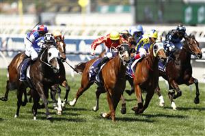 MELBOURNE, AUSTRALIA - NOVEMBER 04: James McDonald riding #5 Djukon wins race 4, the Twitter Trophy during 2021 Oaks Day at Flemington Racecourse on November 04, 2021 in Melbourne, Australia. (Photo by Darrian Traynor/Getty Images)