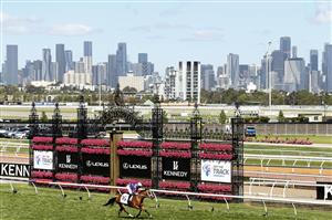 MELBOURNE, AUSTRALIA - NOVEMBER 04: James McDonald riding #16 Espiona wins race 5, the Off The Track Desirable Stakes during 2021 Oaks Day at Flemington Racecourse on November 04, 2021 in Melbourne, Australia. (Photo by Darrian Traynor/Getty Images)