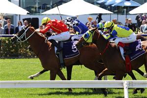 MELBOURNE, AUSTRALIA - NOVEMBER 04: James McDonald riding #5 Djukon wins race 4, the Twitter Trophy during 2021 Oaks Day at Flemington Racecourse on November 04, 2021 in Melbourne, Australia. (Photo by Robert Cianflone/Getty Images)