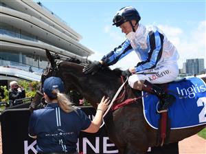 MELBOURNE, AUSTRALIA - NOVEMBER 04: Kerrin McEvoy riding Foxy Frida after winning Race 2, the Inglis Bracelet, during 2021 Oaks Day at Flemington Racecourse on November 04, 2021 in Melbourne, Australia. (Photo by Vince Caligiuri/Getty Images)