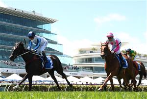 MELBOURNE, AUSTRALIA - NOVEMBER 04: Kerrin McEvoy riding #2 Foxy Frida wins race 2, the Inglis Bracelet during 2021 Oaks Day at Flemington Racecourse on November 04, 2021 in Melbourne, Australia. (Photo by Robert Cianflone/Getty Images)