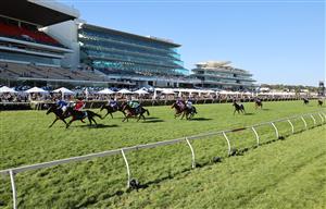 MELBOURNE, AUSTRALIA - NOVEMBER 04: Damien Oliver riding #2 Willowy leads Michael Dee #6 Douceur to win race 8, the Kennedy Oaks during 2021 Oaks Day at Flemington Racecourse on November 04, 2021 in Melbourne, Australia. (Photo by Robert Cianflone/Getty Images)