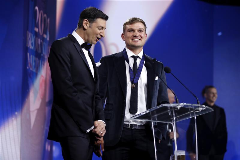 PERTH, AUSTRALIA - SEPTEMBER 19: Ollie Wines of the Power is interviewed by Basil Zempilas during the 2021 Brownlow Medal Count at Optus Stadium on September 19, 2021 in Perth, Australia. (Photo by Dylan Burns/AFL Photos via Getty Images)