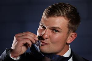 PERTH, AUSTRALIA - SEPTEMBER 19: Brownlow Medallist Ollie Wines of the Power poses for a photograph following the 2021 Brownlow Medal Count at Optus Stadium on September 19, 2021 in Perth, Australia. (Photo by Paul Kane/Getty Images)