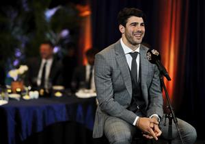 PERTH, AUSTRALIA - SEPTEMBER 19: Christian Petracca of the Demons is interviewed during the 2021 Brownlow Medal Count at Optus Stadium on September 19, 2021 in Perth, Australia. (Photo by Dylan Burns/AFL Photos via Getty Images)