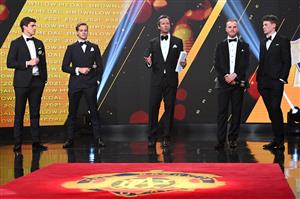 MELBOURNE, AUSTRALIA - SEPTEMBER 19:  Hamish McLachlan talks to Jack Steele of the Saints, Darcy Parish of the Bombers, Tom Mitchell of the Hawks and Sam Walsh of the Blues during the 2021 Brownlow Medal Count at NEP Studios Southbank on September 19, 2021 in Melbourne, Australia. (Photo by Quinn Rooney/Getty Images )
