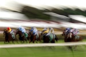 MELBOURNE, AUSTRALIA - NOVEMBER 06: The field gallop down the straight in race 5, the TAB Matriarch Stakes during 2021 Paramount+ Stakes Day at Flemington Racecourse on November 06, 2021 in Melbourne, Australia. (Photo by Robert Cianflone/Getty Images)