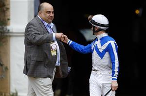 DEL MAR, CALIFORNIA - NOVEMBER 06: Jockey Flavien Prat fist bumps a fan prior to the Breeders' Cup Filly &Mare Sprint at Del Mar Race Track on November 06, 2021 in Del Mar, California. (Photo by Sean M. Haffey/Getty Images)