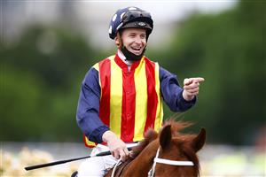 MELBOURNE, AUSTRALIA - NOVEMBER 06: James McDonald riding Nature Strip celebrates winning race 6, the Darley Sprint Classic, during 2021 Paramount+ Stakes Day at Flemington Racecourse on November 06, 2021 in Melbourne, Australia. (Photo by Daniel Pockett/Getty Images)