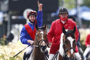 MELBOURNE, AUSTRALIA - NOVEMBER 06: James McDonald riding #4 Zaaki celebrates after winning race 8, Paramount+ Mackinnon Stakes during 2021 Paramount+ Stakes Day at Flemington Racecourse on November 06, 2021 in Melbourne, Australia. (Photo by Daniel Pockett/Getty Images)