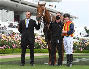 MELBOURNE, AUSTRALIA - NOVEMBER 06: James McDonald riding #1 Nature Strip poses with trainer Chris Waller after winning race 6, the Darley Sprint Classic, during 2021 Paramount + Stakes Day at Flemington Racecourse on November 06, 2021 in Melbourne, Australia. (Photo by Vince Caligiuri/Getty Images)