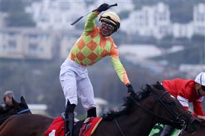 DEL MAR, CALIFORNIA - NOVEMBER 05: Jockey Jose Ortiz celebrates aboard Pizza Bianca after winning the Breeders' Cup Juvenile Fillies Turf at Del Mar Race Track on November 05, 2021 in Del Mar, California. (Photo by Rob Carr/Getty Images)
