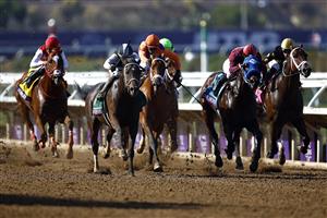 DEL MAR, CALIFORNIA - NOVEMBER 06: Jockey Jose Ortiz rides Aloha West to win the Breeders' Cup Sprint race at Del Mar Race Track on November 06, 2021 in Del Mar, California. (Photo by Sean M. Haffey/Getty Images)