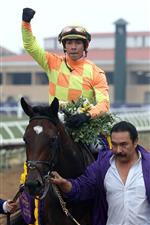 DEL MAR, CALIFORNIA - NOVEMBER 05: Jockey Jose Ortiz celebrates aboard Pizza Bianca after riding the horse to victory in the Breeders' Cup Juvenile Fillies Turf at Del Mar Race Track on November 05, 2021 in Del Mar, California. (Photo by Rob Carr/Getty Images)