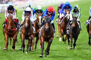 MELBOURNE, AUSTRALIA - NOVEMBER 06: Kerrin McEvoy riding #12 Bend The Knee wins race 4, The Amanda Elliott Handicap during 2021 Paramount+ Stakes Day at Flemington Racecourse on November 06, 2021 in Melbourne, Australia. (Photo by Quinn Rooney/Getty Images)