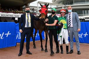 MELBOURNE, AUSTRALIA - NOVEMBER 06: Trainers Ben Hayes (L) and JD Hayes (R) pose with Luke Nolen and #8 Zayydani after winning race 5, the TAB Matriarch Stakes during 2021 Paramount+ Stakes Day at Flemington Racecourse on November 06, 2021 in Melbourne, Australia. (Photo by Vince Caligiuri/Getty Images)