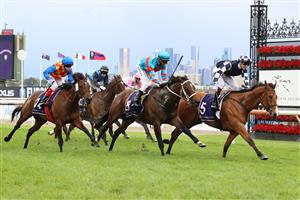 MELBOURNE, AUSTRALIA - NOVEMBER 06: Fred Kersley riding #5 It'sourtime to win race 9, the World Horse Racing Grand Handicap during 2021 Paramount+ Stakes Day at Flemington Racecourse on November 06, 2021 in Melbourne, Australia. (Getty)