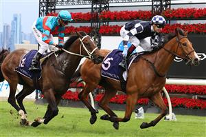MELBOURNE, AUSTRALIA - NOVEMBER 06: Fred Kersley riding #5 It'sourtime to win race 9, the World Horse Racing Grand Handicap during 2021 Paramount+ Stakes Day at Flemington Racecourse on November 06, 2021 in Melbourne, Australia. (Getty)