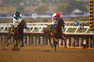 DEL MAR, CALIFORNIA - NOVEMBER 05: Jockey Mike Smith wins the Breeders' Cup Juvenile race aboard Corniche
at Del Mar Race Track on November 05, 2021 in Del Mar, California. (Photo by Sean M. Haffey/Getty Images)