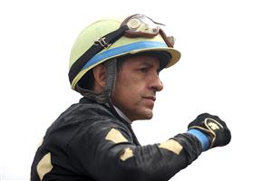 DEL MAR, CALIFORNIA - NOVEMBER 06: Jockey Victor Espinoza celebrates after riding Ce Ce to win the Breeders' Cup Filly & Mare Sprint at Del Mar Race Track on November 06, 2021 in Del Mar, California. (Photo by Rob Carr/Getty Images)