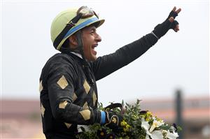 DEL MAR, CALIFORNIA - NOVEMBER 06: Jockey Victor Espinoza celebrates after riding Ce Ce to win the Breeders' Cup Filly & Mare Sprint at Del Mar Race Track on November 06, 2021 in Del Mar, California. (Photo by Rob Carr/Getty Images)