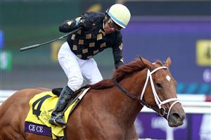 DEL MAR, CALIFORNIA - NOVEMBER 06: Jockey Victor Espinoza celebrates after riding Ce Ce to win the Breeders' Cup Filly & Mare Sprint at Del Mar Race Track on November 06, 2021 in Del Mar, California. (Photo by Rob Carr/Getty Images)