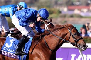 DEL MAR, CALIFORNIA - NOVEMBER 06: Jockey William Buick celebrates after riding Space Blues to win the Breeders' Cup Mile at Del Mar Race Track on November 06, 2021 in Del Mar, California. (Photo by Rob Carr/Getty Images)
