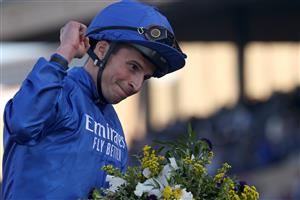 DEL MAR, CALIFORNIA - NOVEMBER 06: Jockey William Buick celebrates after riding Space Blues to win the Breeders' Cup Mile at Del Mar Race Track on November 06, 2021 in Del Mar, California. (Photo by Rob Carr/Getty Images)