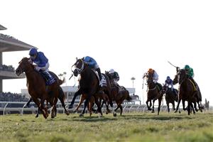 DEL MAR, CALIFORNIA - NOVEMBER 06: Jockey William Buick rides Space Blues to win the Breeders' Cup Mile at Del Mar Race Track on November 06, 2021 in Del Mar, California. (Photo by Rob Carr/Getty Images)