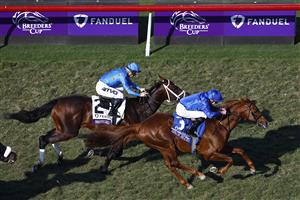 DEL MAR, CALIFORNIA - NOVEMBER 06: Jockey William Buick rides Space Blues to win the Breeders' Cup Mile at Del Mar Race Track on November 06, 2021 in Del Mar, California. (Photo by Sean M. Haffey/Getty Images)