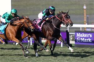 DEL MAR, CALIFORNIA - NOVEMBER 06: Jockey Yuga Kawada rides Loves Only You to victory in the Breeders' Cup Filly & Mare Turf at Del Mar Race Track on November 06, 2021 in Del Mar, California. (Photo by Rob Carr/Getty Images)