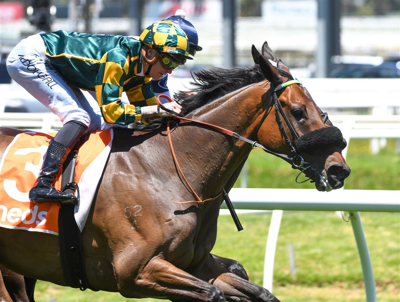 MELBOURNE, AUSTRALIA - NOVEMBER 27: Blaike McDougall riding Dragon Storm winning Race 2, the Neds Sandown Cup,  during Melbourne Racing at Caulfield Racecourse on November 27, 2021 in Melbourne, Australia. (Photo by Vince Caligiuri/Getty Images)
