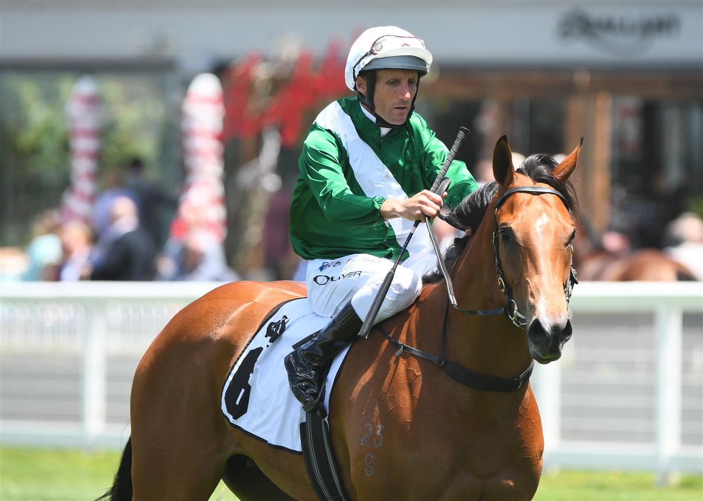 MELBOURNE, AUSTRALIA - NOVEMBER 27: Damien Oliver riding Ebhaar after winning Race 1, the Thoroughbred Club Merson Cooper Stakes, during Melbourne Racing at Caulfield Racecourse on November 27, 2021 in Melbourne, Australia. (Photo by Vince Caligiuri/Getty Images)