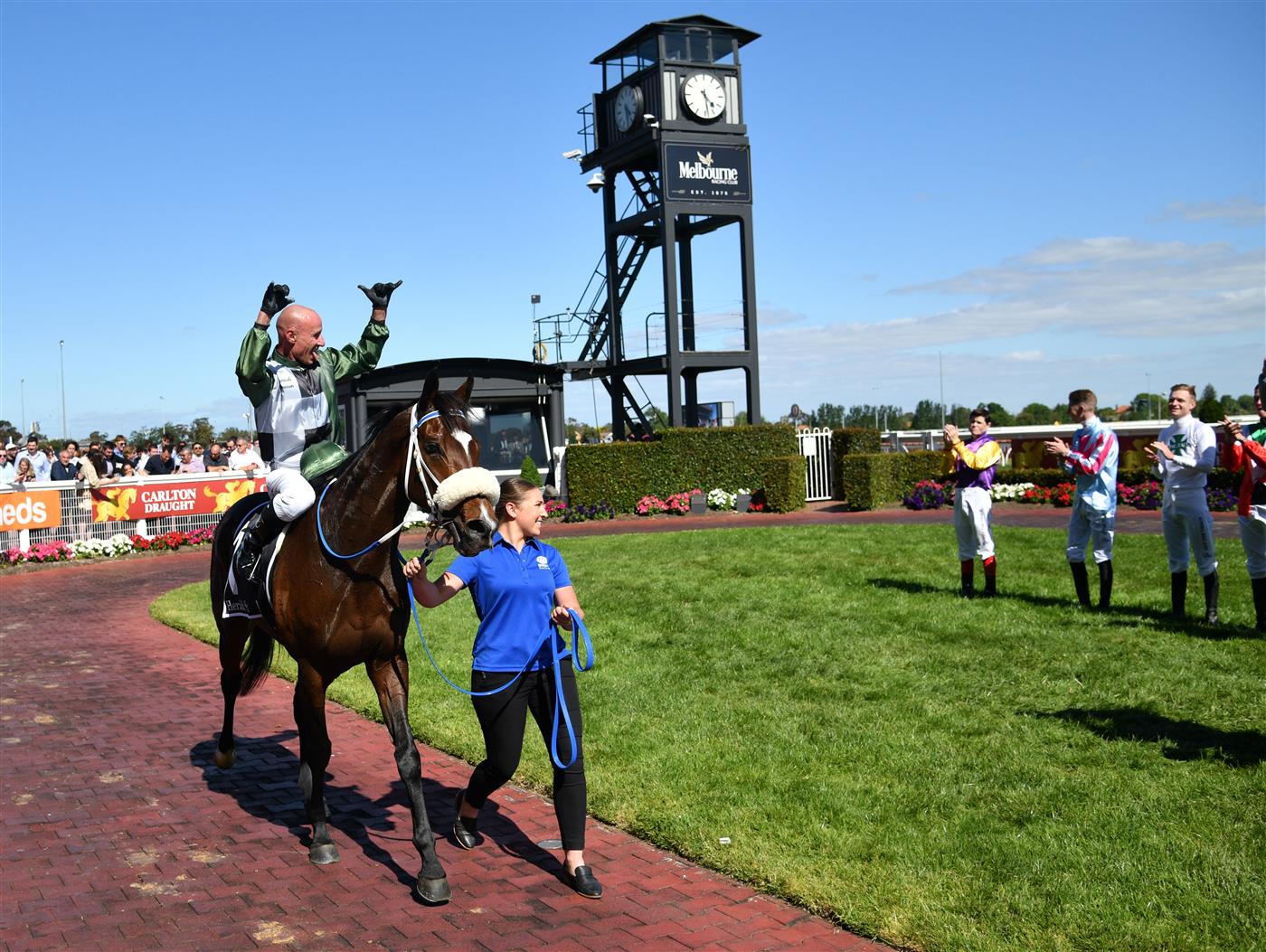 MELBOURNE, AUSTRALIA - NOVEMBER 27: Glen Boss riding Spanish Mission reacts in his last ever race ride after finishing 4th in Race 7, the Herald Sun Zipping Classic, during Melbourne Racing at Caulfield Racecourse on November 27, 2021 in Melbourne, Australia. (Photo by Vince Caligiuri/Getty Images)