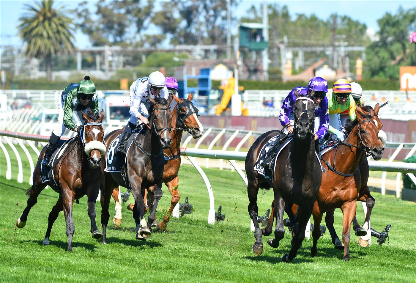 MELBOURNE, AUSTRALIA - NOVEMBER 27: Jamie Mott riding Sound winning Race 7, the Herald Sun Zipping Classic, during Melbourne Racing at Caulfield Racecourse on November 27, 2021 in Melbourne, Australia. Glen Boss riding Spanish Mission (L) in his last ever race ride finishing fourth. (Photo by Vince Caligiuri/Getty Images)