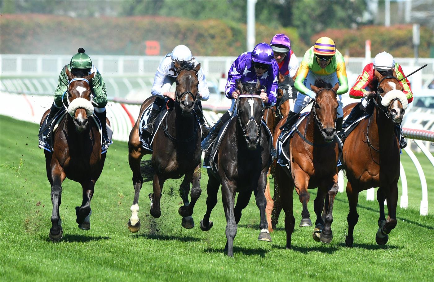 MELBOURNE, AUSTRALIA - NOVEMBER 27: Jamie Mott riding Sound winning Race 7, the Herald Sun Zipping Classic, during Melbourne Racing at Caulfield Racecourse on November 27, 2021 in Melbourne, Australia. Glen Boss riding Spanish Mission (L) in his last ever race ride finishing fourth. (Photo by Vince Caligiuri/Getty Images)