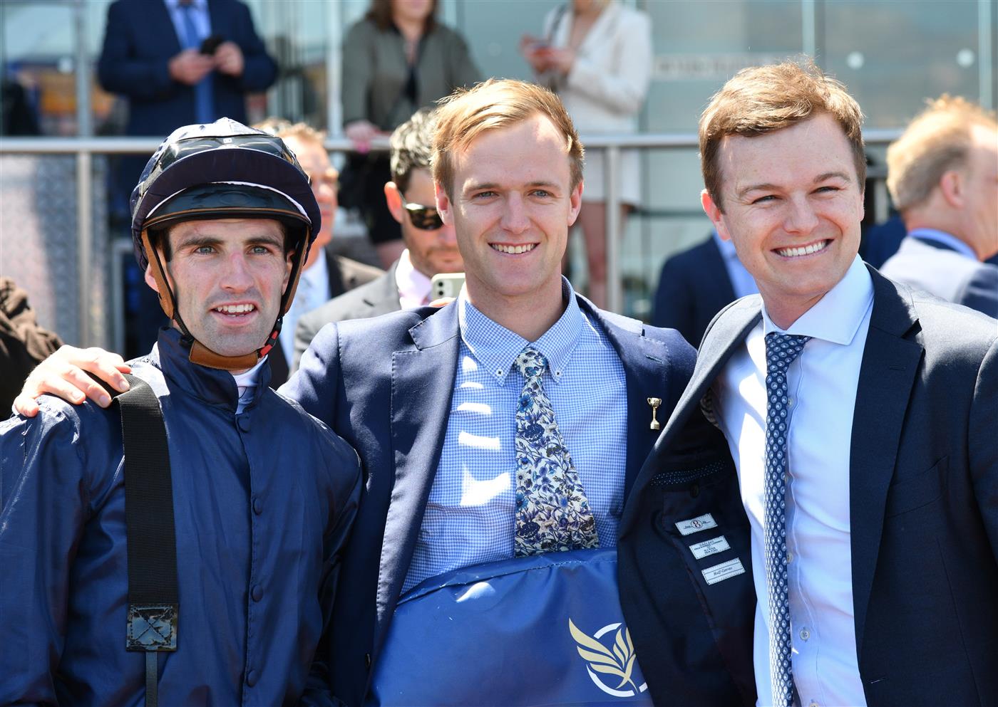 MELBOURNE, AUSTRALIA - NOVEMBER 27: Jake Noonan poses with trainers Will Hayes and Ben Hayes after riding Lady Of Honour to win Race 3, the Tobin Brothers Twilight Glow Stakes, during Melbourne Racing at Caulfield Racecourse on November 27, 2021 in Melbourne, Australia. (Photo by Vince Caligiuri/Getty Images)