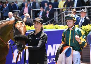 MELBOURNE, AUSTRALIA - NOVEMBER 27: Blaike McDougall riding Dragon Storm after winning Race 2, the Neds Sandown Cup,  during Melbourne Racing at Caulfield Racecourse on November 27, 2021 in Melbourne, Australia. (Photo by Vince Caligiuri/Getty Images)
