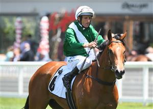 MELBOURNE, AUSTRALIA - NOVEMBER 27: Damien Oliver riding Ebhaar after winning Race 1, the Thoroughbred Club Merson Cooper Stakes, during Melbourne Racing at Caulfield Racecourse on November 27, 2021 in Melbourne, Australia. (Photo by Vince Caligiuri/Getty Images)