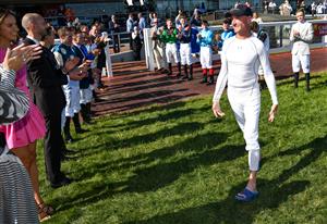 MELBOURNE, AUSTRALIA - NOVEMBER 27: Glen Boss is given a guard of honour after riding Spanish Mission to finish fourth in his last ever race ride in Race 7, the Herald Sun Zipping Classic, during Melbourne Racing at Caulfield Racecourse on November 27, 2021 in Melbourne, Australia. (Photo by Vince Caligiuri/Getty Images)