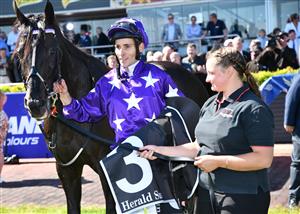 MELBOURNE, AUSTRALIA - NOVEMBER 27: Jamie Mott riding Sound after winning Race 7, the Herald Sun Zipping Classic, during Melbourne Racing at Caulfield Racecourse on November 27, 2021 in Melbourne, Australia. (Photo by Vince Caligiuri/Getty Images)