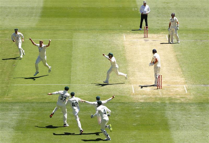 MELBOURNE, AUSTRALIA - DECEMBER 28: Cameron Green of Australia celebrates after dismissing James Anderson of England and retaining the Ashes during day three of the Third Test match in the Ashes series between Australia and England at Melbourne Cricket Ground on December 28, 2021 in Melbourne, Australia. (Photo by Robert Cianflone/Getty Images)