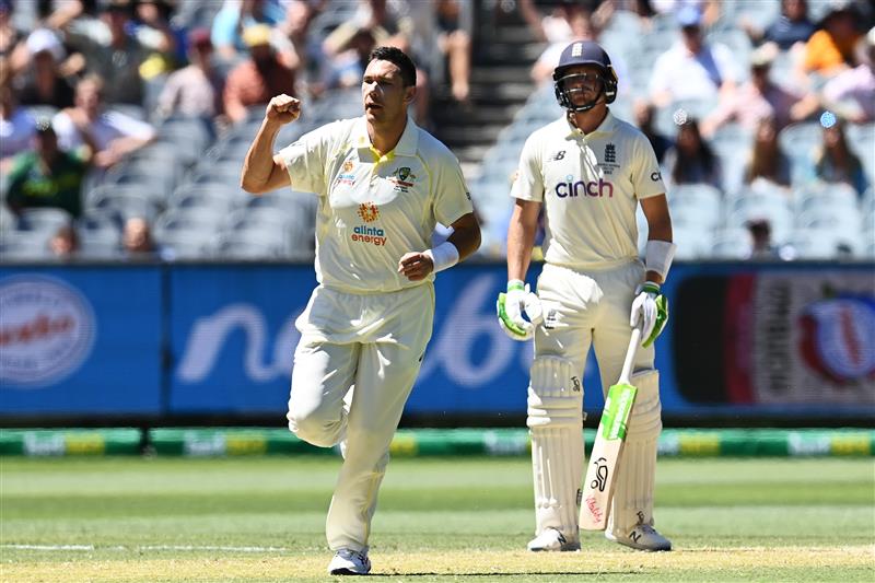 MELBOURNE, AUSTRALIA - DECEMBER 28: Scott Boland of Australia celebrates after dismissing Mark Wood of England during day three of the Third Test match in the Ashes series between Australia and England at Melbourne Cricket Ground on December 28, 2021 in Melbourne, Australia. (Photo by Quinn Rooney/Getty Images)
