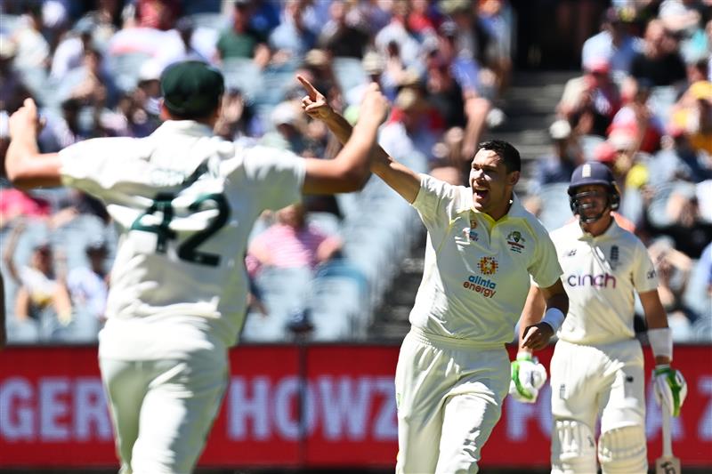 MELBOURNE, AUSTRALIA - DECEMBER 28: Scott Boland of Australia celebrates after dismissing Joe Root of England during day three of the Third Test match in the Ashes series between Australia and England at Melbourne Cricket Ground on December 28, 2021 in Melbourne, Australia. (Photo by Quinn Rooney/Getty Images)